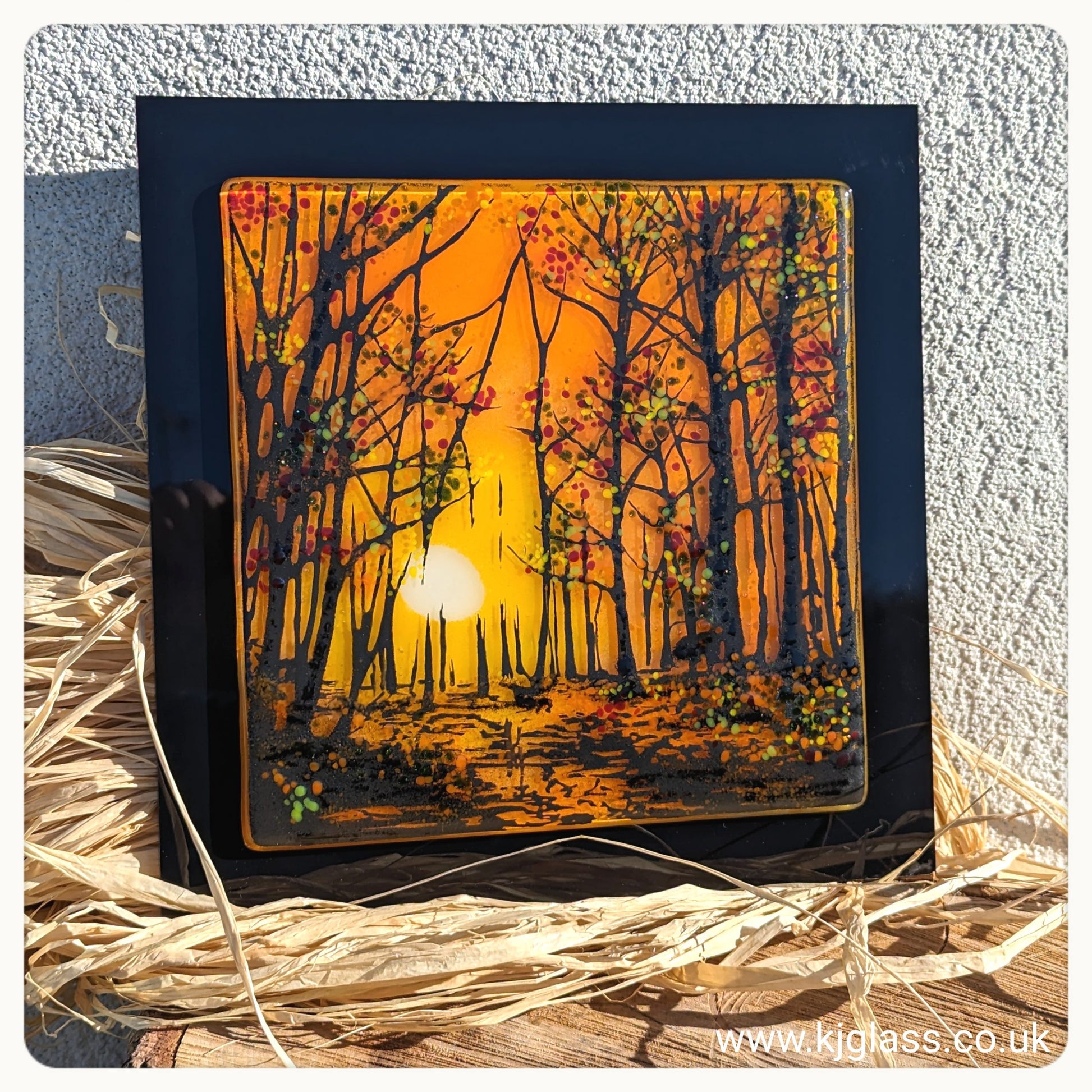 Autumn tree design, fused glass art on a polished black backing board