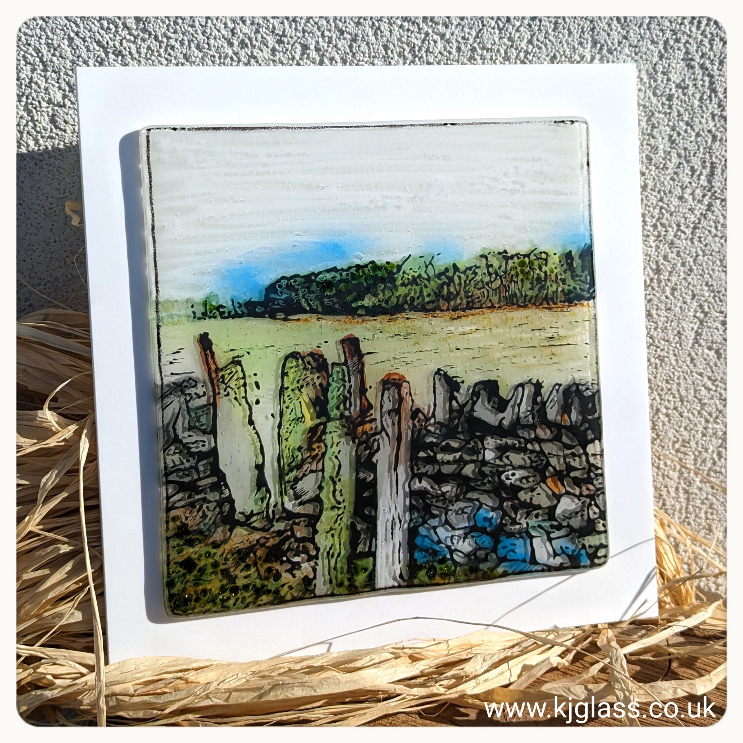 A fabulous art piece depicting a lovely stroll in the countryside. A drystone wall and kissing gate.